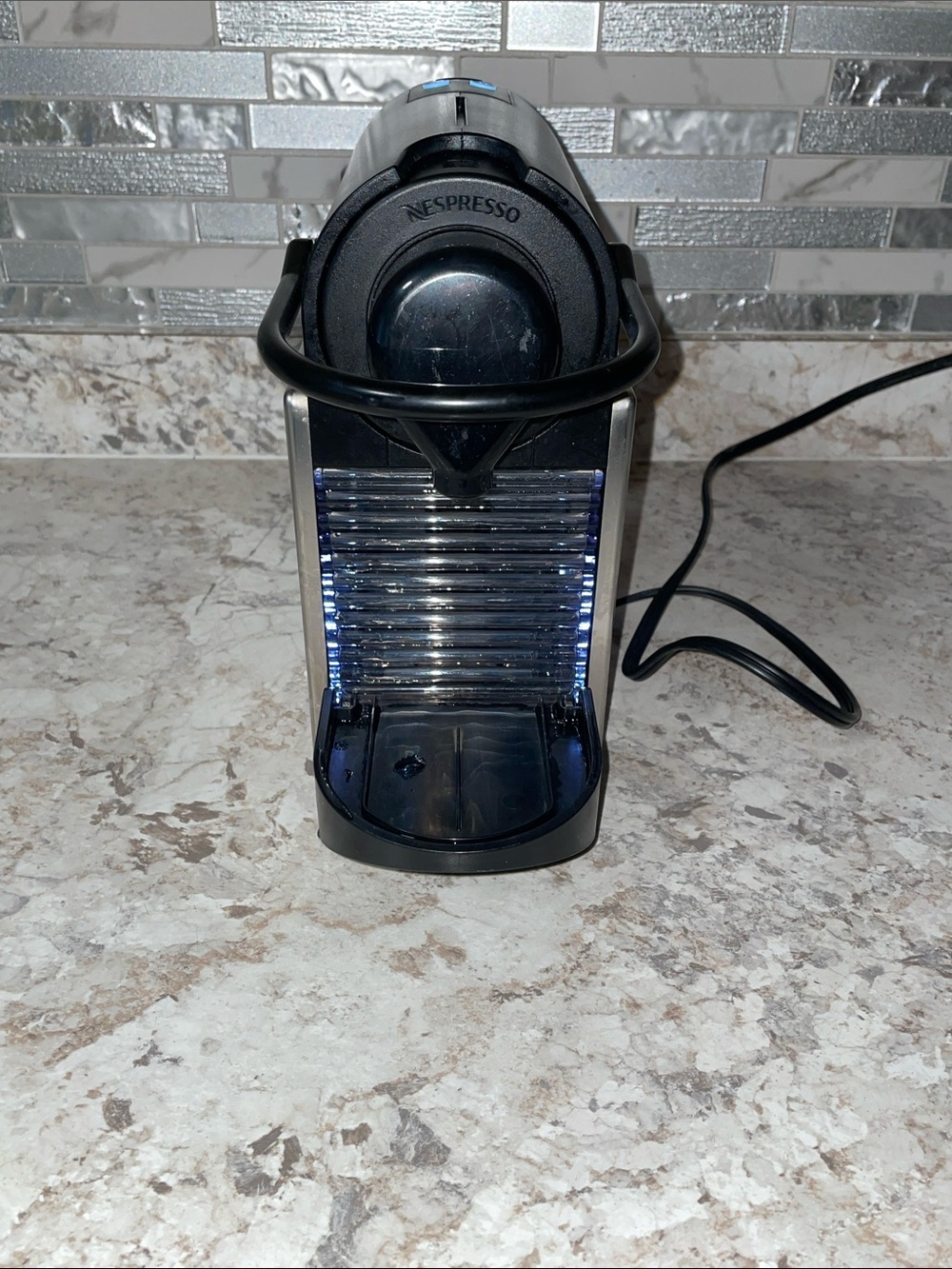 Nespresso Single-Serve Coffee Maker in Black and Silver
